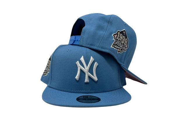 NEW YORK YANKEES 1999 WORLD SERIES SKY BLUE PINK BRIM NEW ERA