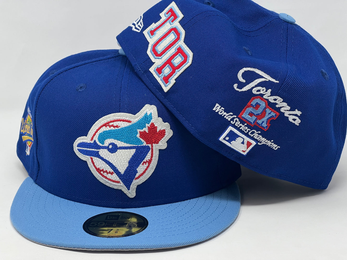 TORONTO BLUE JAYS 2X WORLD SERIES CHAMPIONS GRAY BRIM NEW ERA FITTED HAT