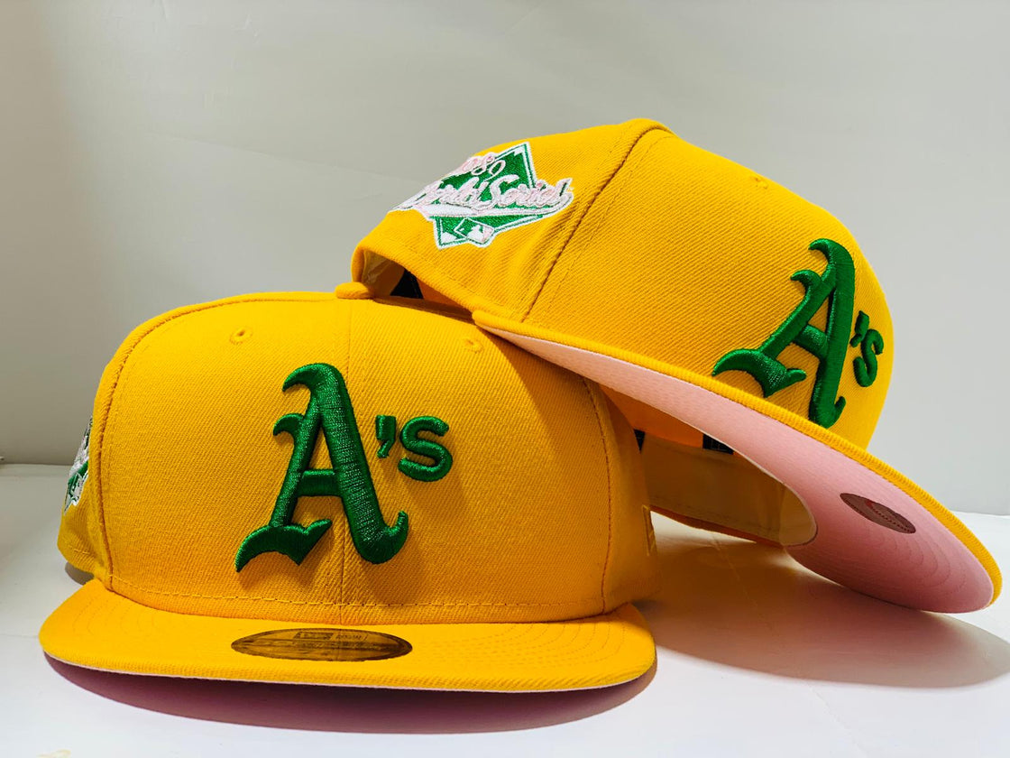 OAKLAND ATHLETICS 1989 WORLD SERIES YELLOW PINK BRIM NEW ERA FITTED HAT