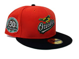 BALTIMORE ORIOLES 30TH ANNIVERSARY GLOW IN THE DARK " PUMPKIN COLLECTION" GREEN BRIM NEW ERA FITTED HAT