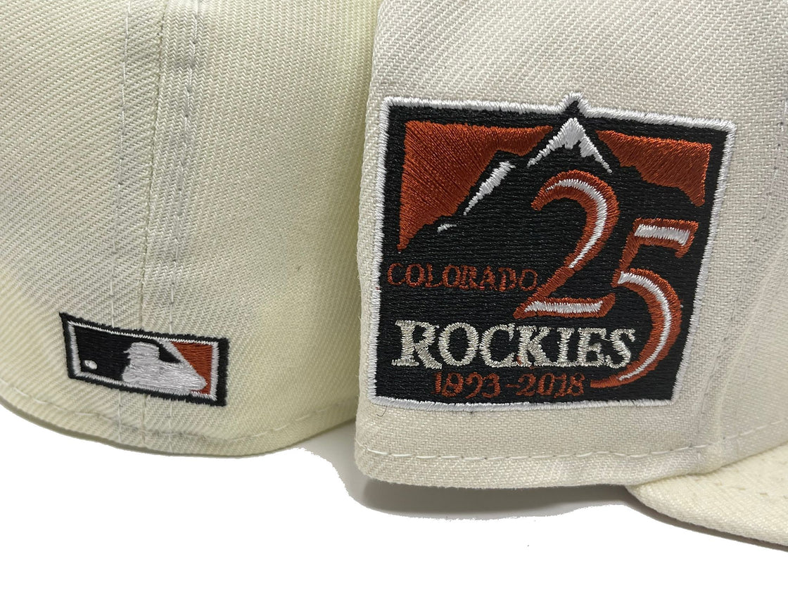 COLORADO ROCKIES 25TH ANNIVERSARY OFF WHITE RUST ORANGE BRIM NEW ERA FITTED HAT