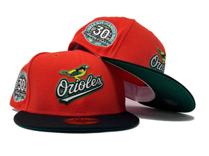 BALTIMORE ORIOLES 30TH ANNIVERSARY GLOW IN THE DARK " PUMPKIN COLLECTION" GREEN BRIM NEW ERA FITTED HAT
