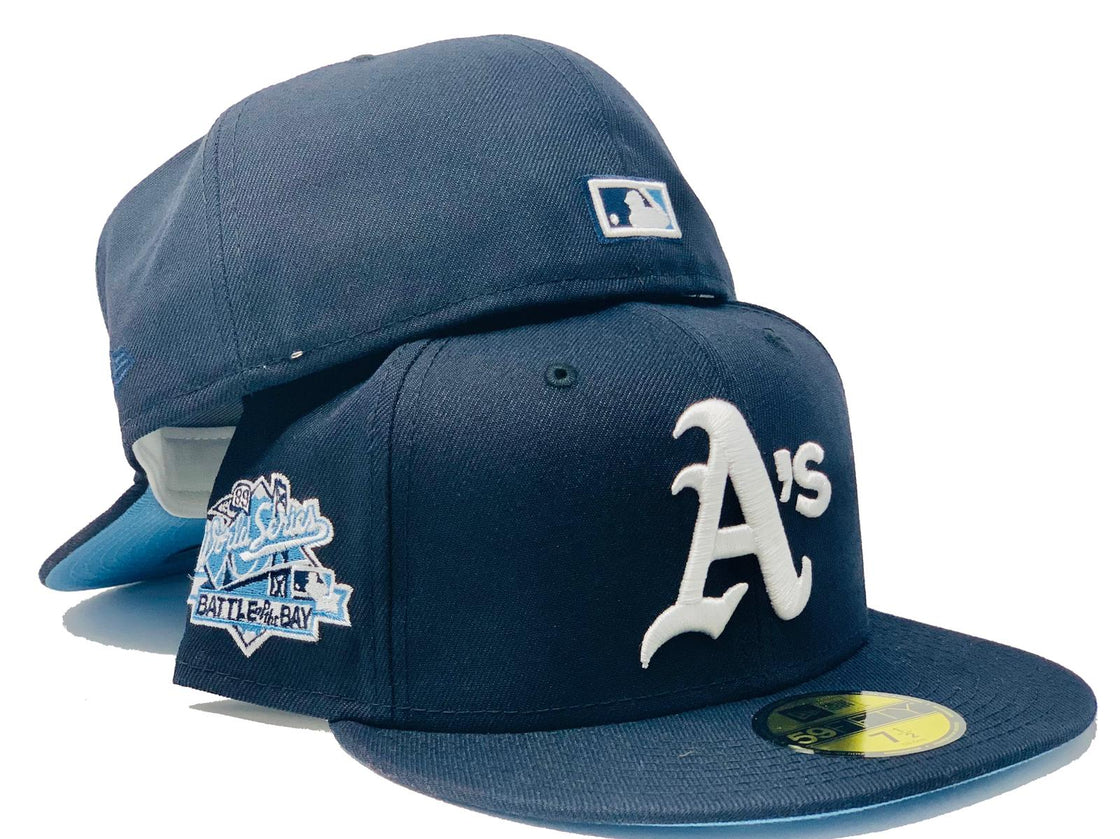 OAKLAND ATHLETICS 1989 BATTLE OF THE BAY NAVY BLUE ICY BRIM NEW ERA FITTED HAT
