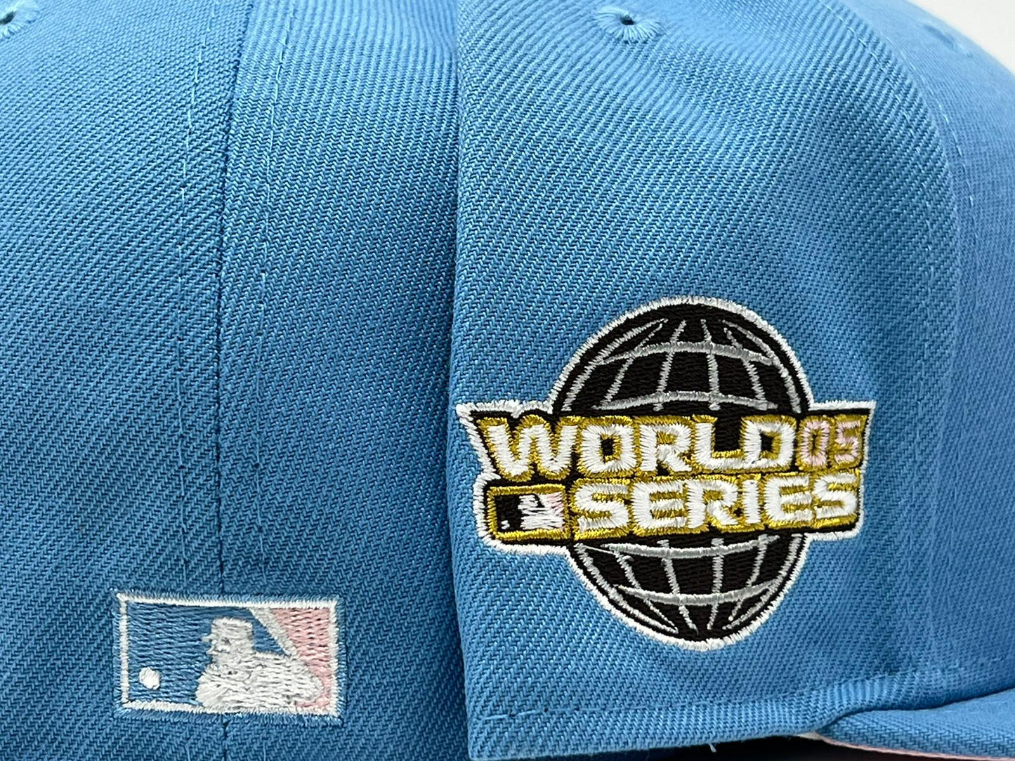 HOUSTON ASTROS 2005 WORLD SERIES SKY BLUE PINK BRIM NEW ERA FITTED HAT