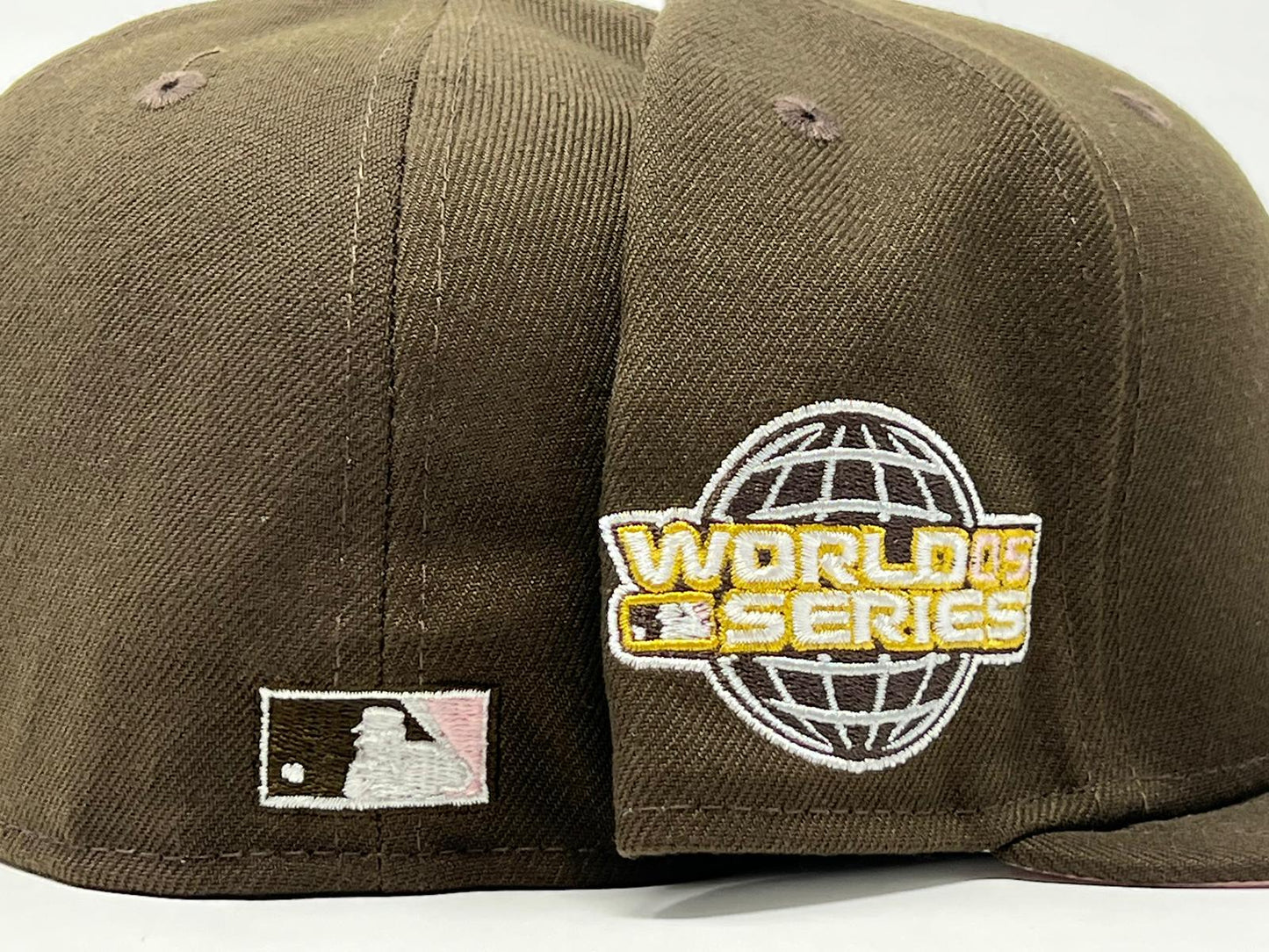 HOUSTON ASTROS 2005 WORLD SERIES DARK BROWN PINK BRIM NEW ERA FITTED HAT