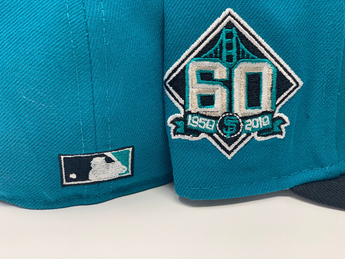 SAN FRANCISCO GIANTS 60TH ANNIVERSARY "NHL CROSS OVER" AQUA  GRAY BRIM NEW ERA FITTED HAT