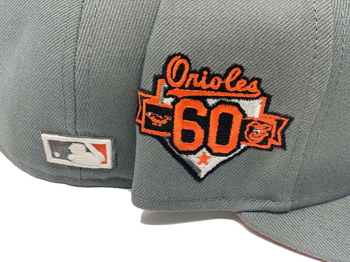 BALTIMORE ORIOLES 60TH ANNIVERSARY STORM GRAY ORANGE BRIM NEW ERA FITTED HAT