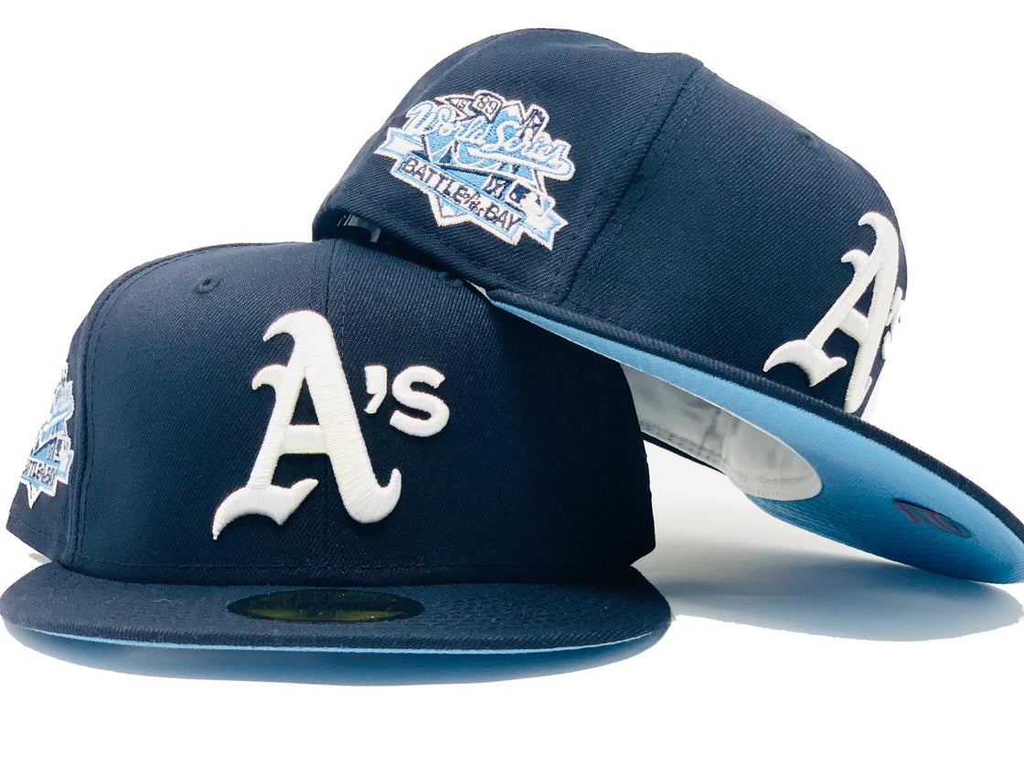 OAKLAND ATHLETICS 1989 BATTLE OF THE BAY NAVY BLUE ICY BRIM NEW ERA FITTED HAT