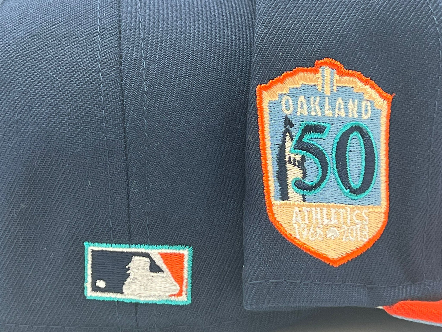 OAKLAND ATHLETICS 50TH ANNIVERSARY LIGHT NAVY ORANGE VISOR ICY BRIM NEW ERA FITTED HAT
