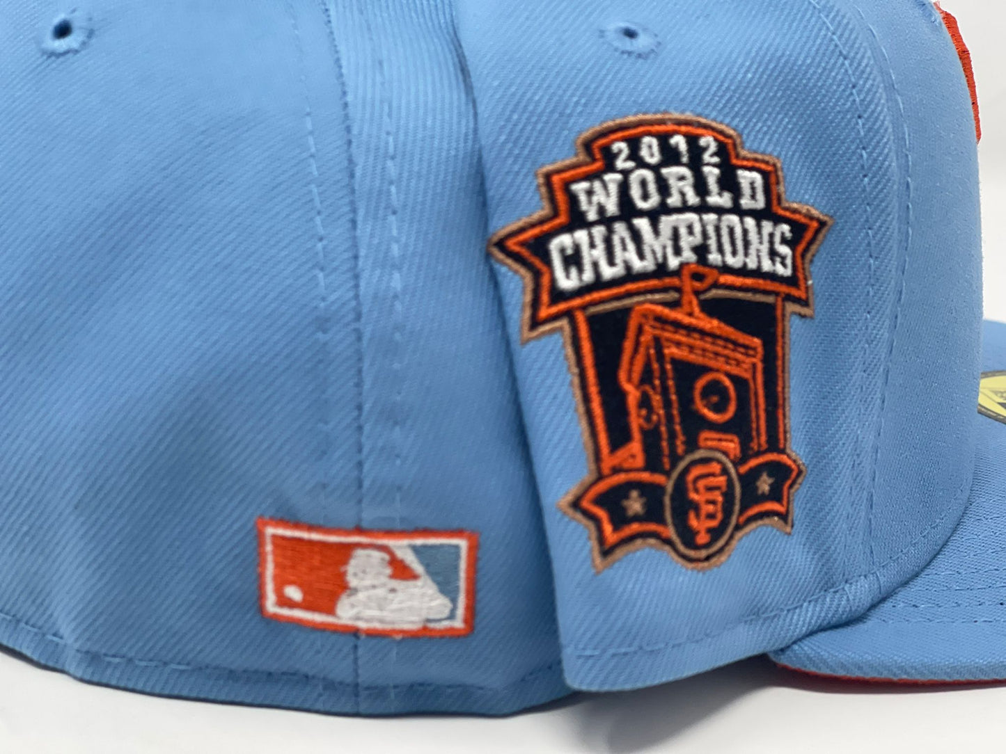 SAN FRANCISCO GIANTS 2012 WORLD CHAMPIONS SKY BLUE ORANGE BRIM NEW ERA FITTED HAT