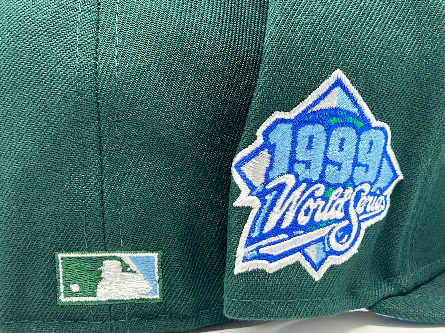 NEW YORK YANKEES 1999 WORLD SERIES DARK GREEN ICY BRIM NEW ERA FITTED HAT